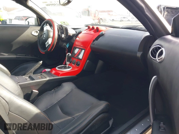 2005 Nissan 350Z Touring z VIN JN1AZ36A05M755776, wystawiony jako IAAI lot #41509506 z przebiegiem 79 148 mil mil oraz . Historia ofert i sprzedaży dostępna na DreamBid. Obrazek 5.