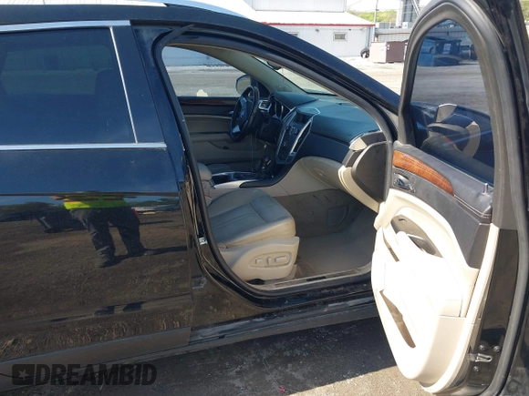 2012 Cadillac SRX Luxury Collection with VIN 3GYFNAE33CS659315, listed as a IAAI auction lot 42169849 with 164,018 mi miles and . Bid and sale history available at carsss.com. Image 5.