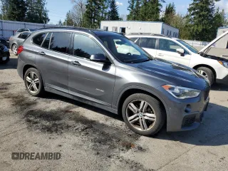 2016 BMW X1 xDrive28i with VIN WBXHT3C36G5E48019, listed as a Copart auction lot 51843235 with 95,711 mi miles and Salvage Title. Bid and sale history available at carsss.com. Image 4.