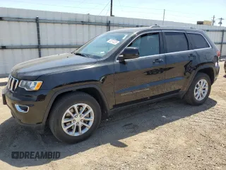 2021 Jeep Grand Cherokee Laredo E with VIN 1C4RJFAG8MC817661, listed as a Copart auction lot 52374235 with 25,305 mi miles and Salvage title. Bid and sale history available at DreamBid. Image 1.