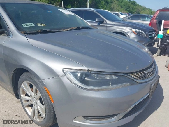 2015 Chrysler 200 Limited with VIN 1C3CCCAB1FN656181, listed as a IAAI auction lot 42011014 with 293,897 mi miles. Bid and sale history available at carsss.com. Image 6.