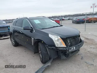 2014 Cadillac SRX Premium Collection z VIN 3GYFNGE38ES598047, wystawiony jako IAAI lot #41577645 z przebiegiem 229 778 mil mil oraz . Historia ofert i sprzedaży dostępna na DreamBid. Obrazek 1.