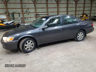 2001 Toyota Camry CE z VIN JT2BG22K710585863, wystawiony jako Copart lot #58315105 z przebiegiem 209 681 mil mil oraz Czysty tytuł • Clean title. Historia ofert i sprzedaży dostępna na DreamBid. Obrazek 1.
