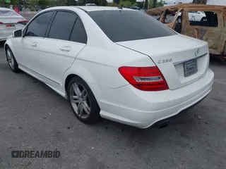 2014 Mercedes-Benz C-Class C 250 Sport with VIN WDDGF4HB9EA945465, listed as a IAAI auction lot 42035693 with 146,809 mi miles. Bid and sale history available at carsss.com. Image 3.
