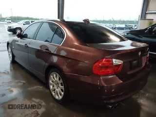 2006 BMW 3 Series 330xi with VIN WBAVD33526KV59403, listed as a IAAI auction lot 41908734 with 136,349 mi miles. Bid and sale history available at carsss.com. Image 3.