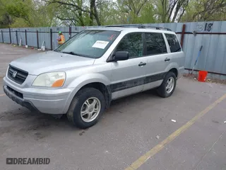 2005 Honda Pilot LX with VIN 2HKYF18105H556470, listed as a IAAI auction lot 42094372 with 266,089 mi miles. Bid and sale history available at carsss.com. Image 2.