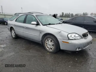 2004 Mercury Sable LS Premium with VIN 1MEHM59S54A605655, listed as a Copart auction lot 82005284 with 101,723 mi miles and Salvage Title. Bid and sale history available at DreamBid. Image 4.