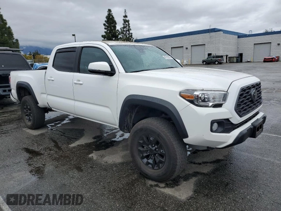 2021 Toyota Tacoma 4WD SR5 with VIN 3TMDZ5BN0MM114807, listed as a Copart auction lot 47781815 with 16,976 mi miles and Salvage Title. Bid and sale history available at carsss.com. Image 4.