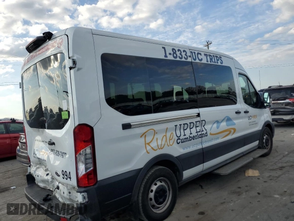 2021 Ford Transit with VIN 1FDAX2CG2MKA23709, listed as a Copart auction lot 74054214 with 105,503 mi miles and Salvage Title. Bid and sale history available at DreamBid. Image 3.