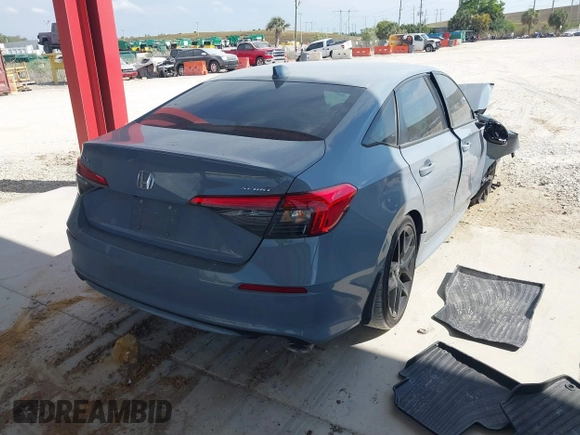 2022 Honda Civic Sport with VIN 2HGFE2F53NH561551, listed as a IAAI auction lot 41865892 with 24,011 mi miles and . Bid and sale history available at carsss.com. Image 4.