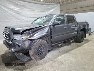 2022 Toyota Tacoma SR с VIN 3TYCZ5AN0NT085800, выставлен на аукционе Copart как лот 54217895 с пробегом 36 200 миль миль и Списание • Salvage title. История ставок и продаж доступна на DreamBid. Изображение 1.