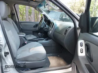 2007 Ford Escape XLT with VIN 1FMCU93167KA51832, listed as a IAAI auction lot 42115125 with 148,584 mi miles. Bid and sale history available at carsss.com. Image 5.