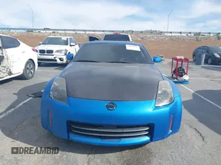 2007 Nissan 350Z Touring z VIN JN1BZ34E37M550112, wystawiony jako IAAI lot #41878280 z przebiegiem 87 374 mil mil oraz . Historia ofert i sprzedaży dostępna na DreamBid. Obrazek 12.