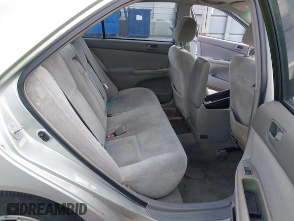 2003 Toyota Camry LE z VIN 4T1BF32K33U044476, wystawiony jako IAAI lot #42464651 z przebiegiem 206 004 mil mil oraz . Historia ofert i sprzedaży dostępna na DreamBid. Obrazek 8.