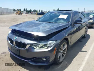2015 BMW 4 Series 428i with VIN WBA4A5C59FG052596, listed as a IAAI auction lot 42649927 with 68,842 mi miles and . Bid and sale history available at DreamBid. Image 2.