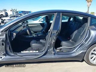 2022 Tesla Model 3 with VIN 5YJ3E1EA8NF241691, listed as a IAAI auction lot 41742584 with 70,375 mi miles and . Bid and sale history available at DreamBid. Image 14.