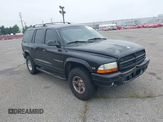 1999 Dodge Durango z VIN 1B4HS28Y2XF601465, wystawiony jako IAAI lot #41686754 z przebiegiem 168 550 mil mil oraz . Historia ofert i sprzedaży dostępna na DreamBid. Obrazek 1.