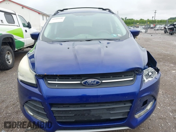 2013 Ford Escape SE with VIN 1FMCU9GX1DUD83174, listed as a IAAI auction lot 42509186 with 164,584 mi miles and . Bid and sale history available at DreamBid. Image 12.