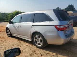2012 Honda Odyssey Touring с VIN 5FNRL5H93CB137468, выставлен на аукционе Copart как лот 59330545 с пробегом 105 880 миль миль и Списание • Salvage title. История ставок и продаж доступна на DreamBid. Изображение 2.