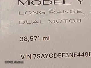 2022 Tesla Model Y Long Range with VIN 7SAYGDEE3NF449873, listed as a IAAI auction lot 41900271 with 38,571 mi miles and . Bid and sale history available at carsss.com. Image 15.