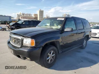2000 Cadillac Escalade z VIN 1GYEK13R0YR167895, wystawiony jako Copart lot #82586443 z przebiegiem 267 099 mil mil oraz Szkody całkowita. Historia ofert i sprzedaży dostępna na DreamBid. Obrazek 1.