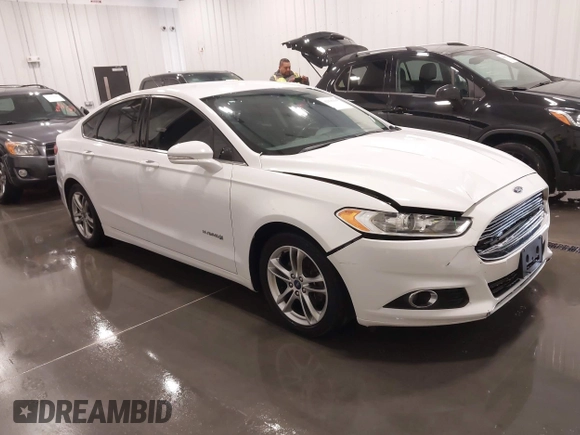 2015 Ford Fusion SE Hybrid with VIN 3FA6P0LU8FR215788, listed as a IAAI auction lot 42038194 with 136,949 mi miles and . Bid and sale history available at DreamBid. Image 1.