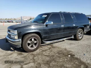 1999 Chevrolet Suburban with VIN 3GNEC16R3XG270099, listed as a Copart auction lot 71041704 with 269,329 mi miles and Salvage Title. Bid and sale history available at carsss.com. Image 1.
