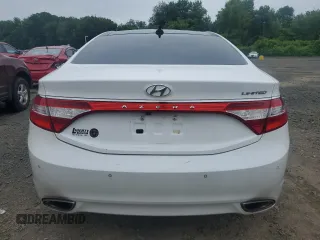 2014 Hyundai Azera Limited z VIN KMHFH4JG9EA342081, wystawiony jako Copart lot #60151565 z przebiegiem 138 351 mil mil oraz Szkoda całkowita • Salvage title. Historia ofert i sprzedaży dostępna na DreamBid. Obrazek 6.