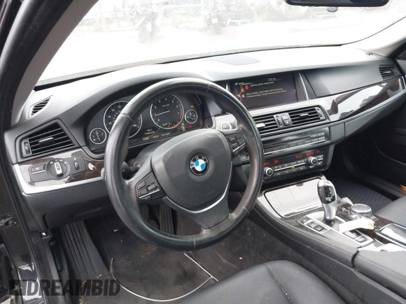 2015 BMW 5 Series 528i with VIN WBA5A5C56FD514814, listed as a IAAI auction lot 42052381 with 76,306 mi miles. Bid and sale history available at carsss.com. Image 20.