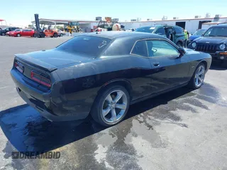 2015 Dodge Challenger R/T with VIN 2C3CDZAT3FH707200, listed as a IAAI auction lot 42154182 with 93,868 mi miles and . Bid and sale history available at DreamBid. Image 4.