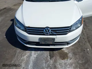 2012 Volkswagen Passat SE with VIN 1VWBP7A3XCC039314, listed as a IAAI auction lot 41741077 with 169,305 mi miles. Bid and sale history available at carsss.com. Image 12.