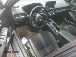 2022 Honda Civic Sport z VIN 2HGFE2F55NH111268, wystawiony jako Copart lot #57655735 z przebiegiem Nie podano mil oraz Szkoda całkowita • Salvage title. Historia ofert i sprzedaży dostępna na DreamBid. Obrazek 8.