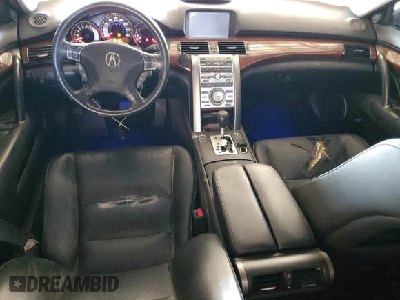 2005 Acura RL z VIN JH4KB16575C011187, wystawiony jako Copart lot #60276655 z przebiegiem 107 378 mil mil oraz Szkoda całkowita • Salvage title. Historia ofert i sprzedaży dostępna na DreamBid. Obrazek 8.