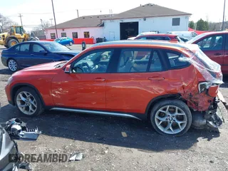 2015 BMW X1 xDrive28i with VIN WBAVL1C57FVY27822, listed as a IAAI auction lot 41977545 with 76,211 mi miles. Bid and sale history available at carsss.com. Image 14.
