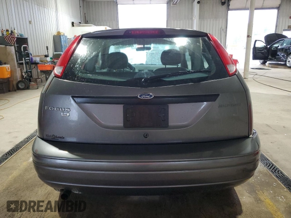 2007 Ford Focus S с VIN 1FAFP31N67W259641, выставлен на аукционе Copart как лот 58709005 с пробегом 140 109 миль миль и Списание • Salvage title. История ставок и продаж доступна на DreamBid. Изображение 6.