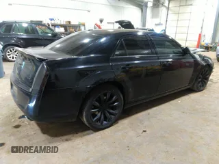 2014 Chrysler 300 S with VIN 2C3CCABG2EH343503, listed as a IAAI auction lot 40934463 with 128,876 mi miles and . Bid and sale history available at carsss.com. Image 4.