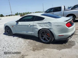 2021 Ford Mustang Mach 1 z VIN 1FA6P8R07M5555808, wystawiony jako Copart lot #56512115 z przebiegiem 19 974 mil mil oraz Szkoda całkowita • Salvage title. Historia ofert i sprzedaży dostępna na DreamBid. Obrazek 2.