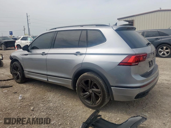 2023 Volkswagen Tiguan SE R-Line Black with VIN 3VVCB7AX5PM128335, listed as a Copart auction lot 56128305 with 21,524 mi miles and Salvage title. Bid and sale history available at DreamBid. Image 2.