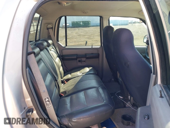 2003 Ford Explorer Sport Trac XLS z VIN 1FMZU77E63UA25807, wystawiony jako IAAI lot #42104625 z przebiegiem 230 608 mil mil oraz . Historia ofert i sprzedaży dostępna na DreamBid. Obrazek 8.