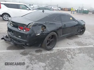 2013 Chevrolet Camaro LT z VIN 2G1FB1E3XD9142079, wystawiony jako IAAI lot #42260678 z przebiegiem 120 292 mil mil oraz . Historia ofert i sprzedaży dostępna na DreamBid. Obrazek 4.