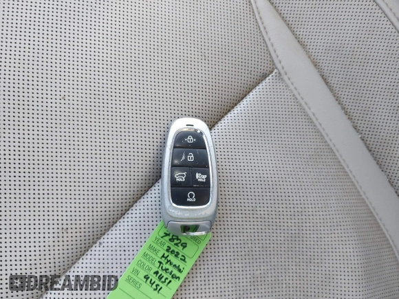 2022 Hyundai Tucson SEL z VIN 5NMJCCAE0NH149457, wystawiony jako IAAI lot #42166988 z przebiegiem 51 930 mil mil oraz . Historia ofert i sprzedaży dostępna na DreamBid. Obrazek 11.