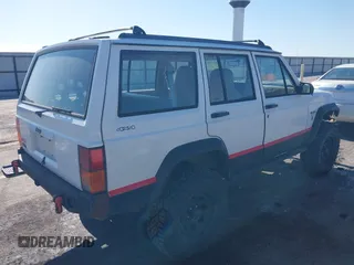 1995 Jeep Cherokee Sport with VIN 1J4FJ68S1SL576255, listed as a IAAI auction lot 42178902 with 214,041 mi miles and . Bid and sale history available at DreamBid. Image 4.