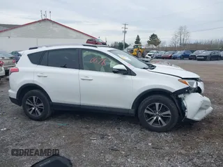 2018 Toyota RAV4 XLE with VIN JTMRFREV8JJ225065, listed as a IAAI auction lot 41940678 with 145,074 mi miles. Bid and sale history available at carsss.com. Image 13.