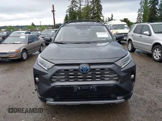 2021 Toyota RAV4 Hybrid XSE with VIN 2T3E6RFV4MW004081, listed as a IAAI auction lot 42300195 with 63,238 mi miles and . Bid and sale history available at DreamBid. Image 12.