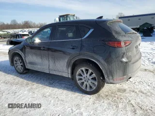 2021 Mazda CX-5 Grand Touring with VIN JM3KFBDM5M1456650, listed as a Copart auction lot 42124045 with 45,205 mi miles and Salvage Title. Bid and sale history available at carsss.com. Image 2.