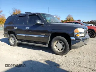 2004 GMC Yukon SLE with VIN 1GKEK13V24J236327, listed as a Copart auction lot 76896974 with 151,028 mi miles and Salvage Title. Bid and sale history available at carsss.com. Image 4.