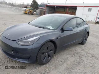 2023 Tesla Model 3 with VIN 5YJ3E1EA5PF474382, listed as a IAAI auction lot 41764268 with 31,040 mi miles and . Bid and sale history available at DreamBid. Image 2.
