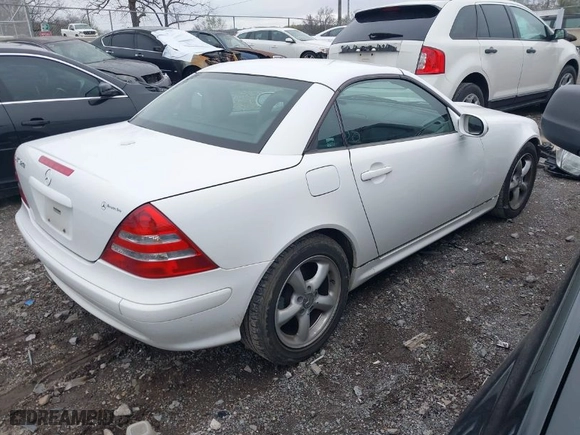 2001 Mercedes-Benz SLK-Class with VIN WDBKK65F21F209191, listed as a IAAI auction lot 41902165 with 75,877 mi miles. Bid and sale history available at carsss.com. Image 4.