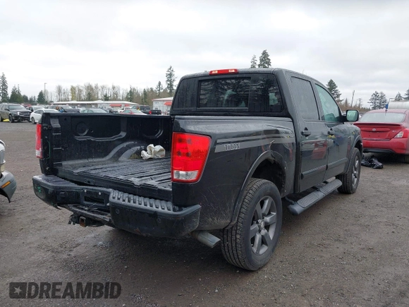 2012 Nissan Titan SV with VIN 1N6BA0EJ0CN303050, listed as a IAAI auction lot 41892370 with 120,018 mi miles. Bid and sale history available at carsss.com. Image 4.
