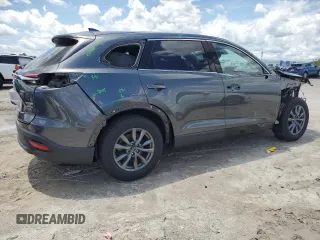 2020 Mazda CX-9 Touring с VIN JM3TCACY2L0414453, выставлен на аукционе Copart как лот 63451845 с пробегом 65 380 миль миль и Списание • Salvage title. История ставок и продаж доступна на DreamBid. Изображение 3.